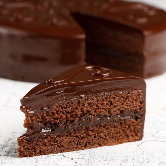 ganache coated chocolate cake